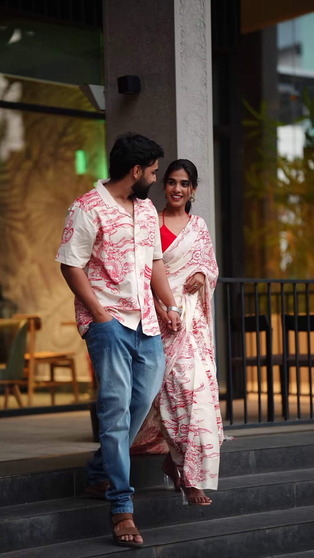 Couple’s Coordinated Ethnic Ensemble – White & Red Printed Saree with Matching Shirt and Jeans - Image 7