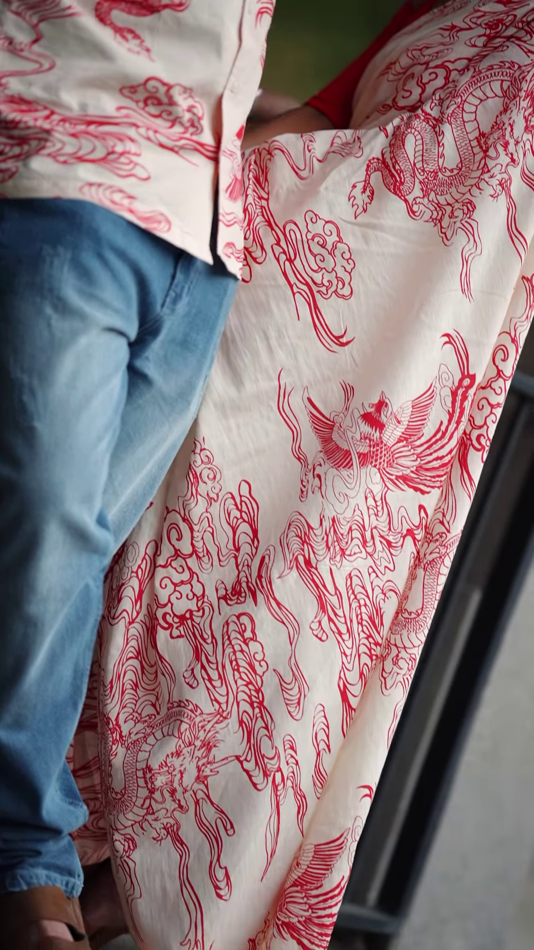 Couple’s Coordinated Ethnic Ensemble – White & Red Printed Saree with Matching Shirt and Jeans - Image 2