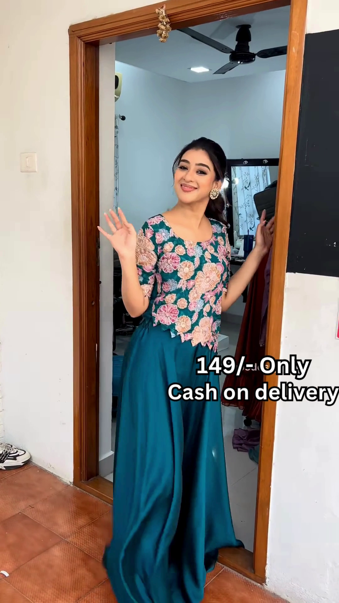 Women’s Red Embroidered Skirt Top Set with Traditional Earrings – Ethnic Doorway Portrait Ensemble - Image 6