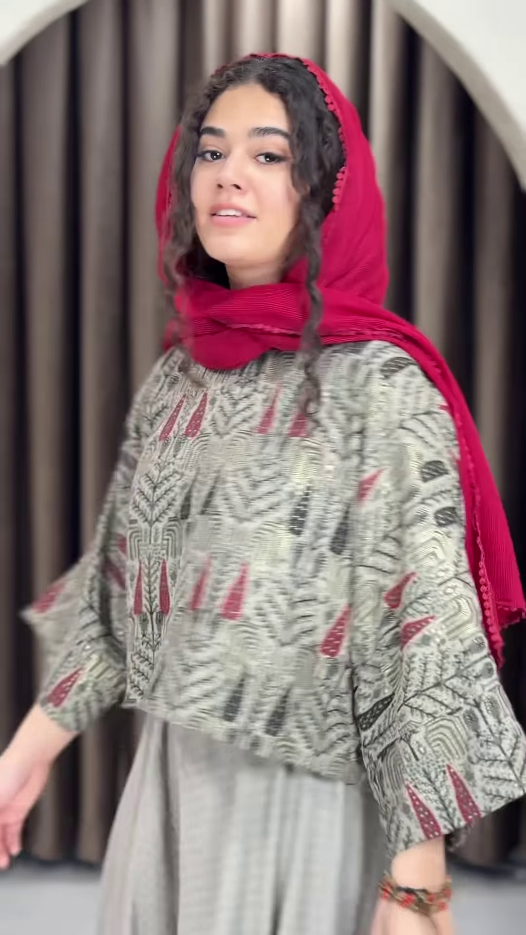 Women’s Red Printed Headscarf with Abstract Top & Gray Wide-Leg Pants – Boho Urban Doorway Portrait Ensemble - Image 3