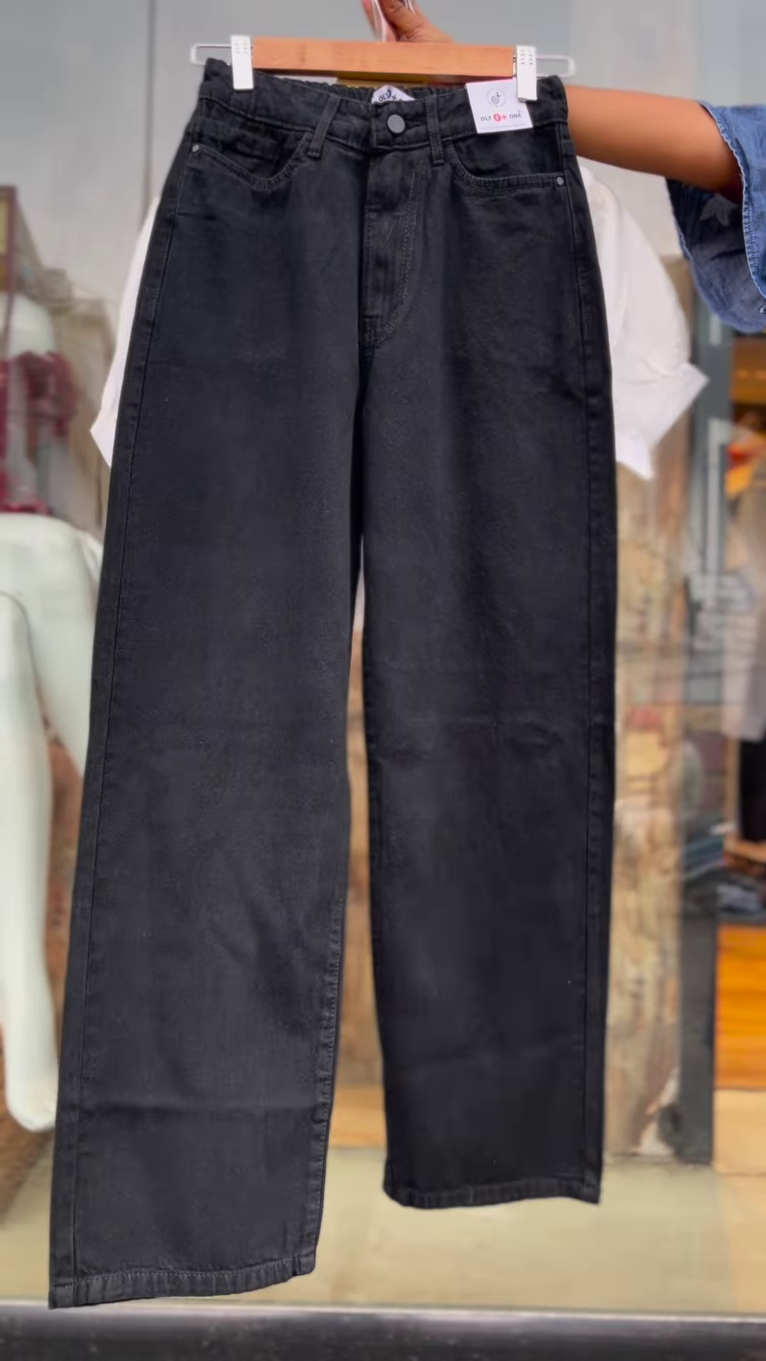 Women’s White Buttoned Crop Jacket with Striped Inner Top and Black Pants – Layered Streetwear Ensemble - Image 2