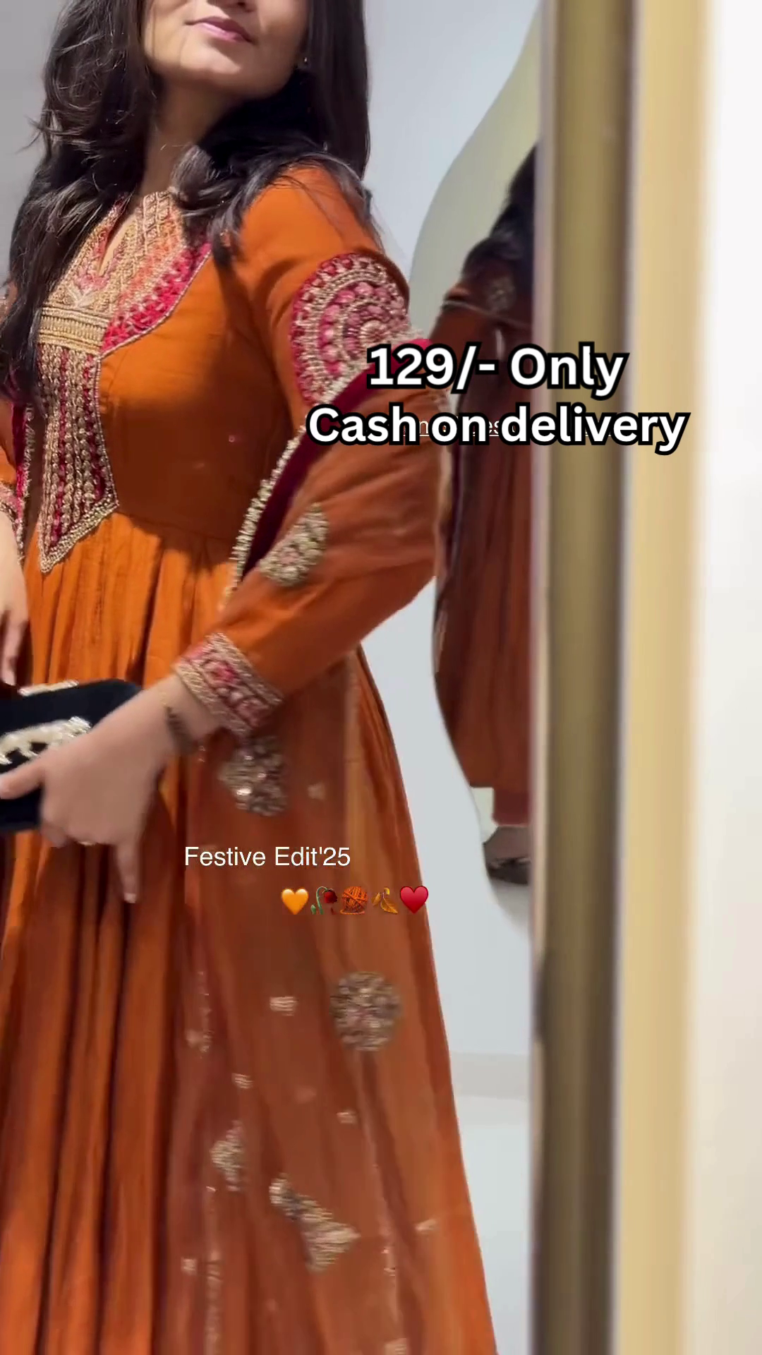 Women’s Orange Embroidered Kurti with Gold & Red Threadwork – Festive Ethnicwear Styled with Black Clutch Accessory - Image 4