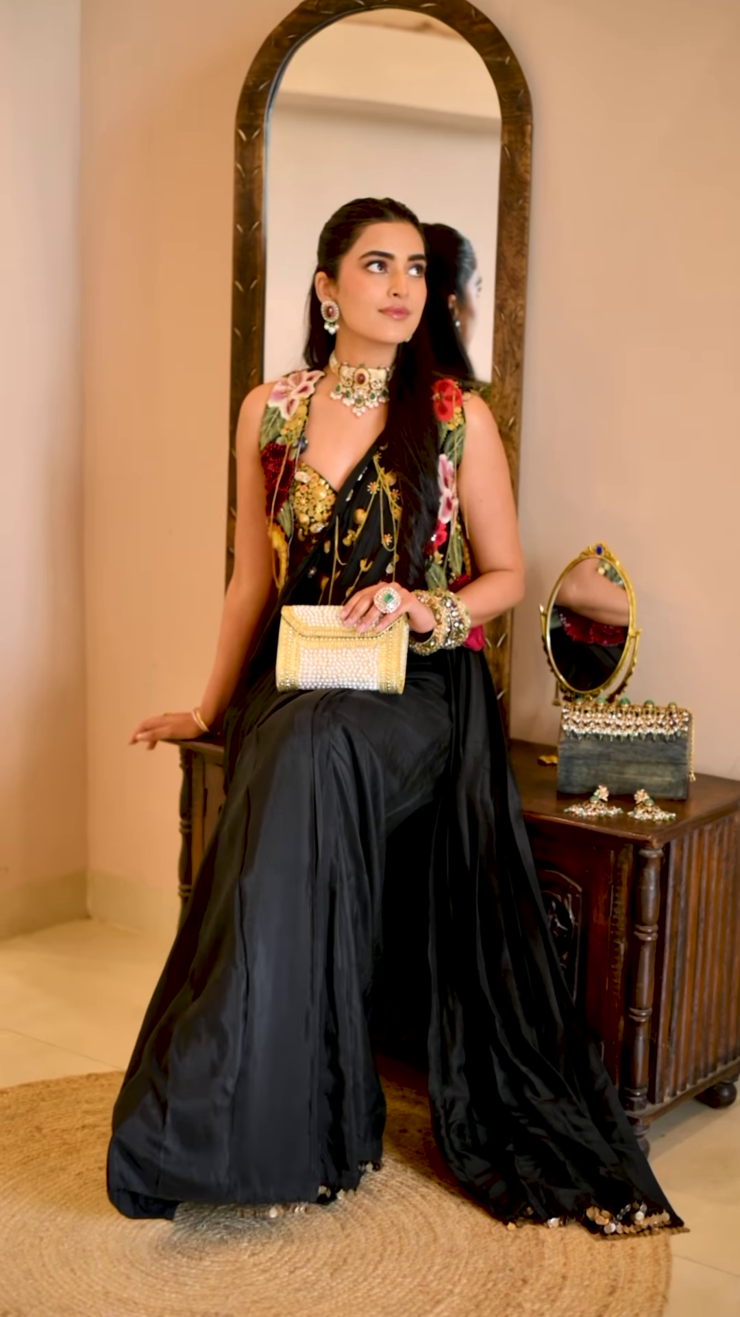 Women’s Black Saree with Gold Embellishments & Pleated Draping – Elegant Ethnicwear Styled with Traditional Bracelet - Image 8